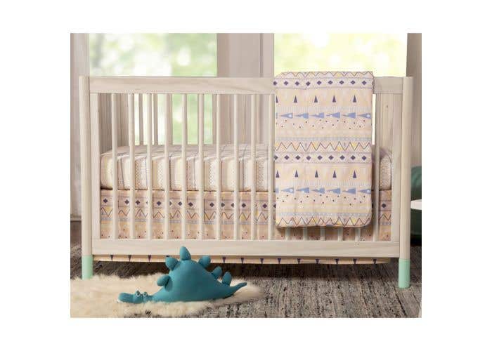 white washed baby crib