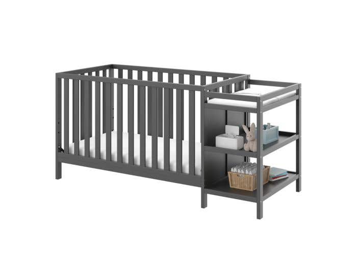 grey crib with attached changing table